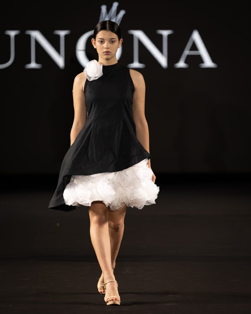 Model in a black and white tulle dress